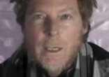 Image of Timothy Weekes (of Australia) begs for help from the American Government (YouTube screenshot).
