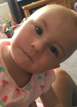 Poppy Smith became unresponsive but a touch from her big sister roused her from the dangerous sleep (PA Real Life).
