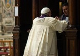 Image of Pope Francis goes to Confession.