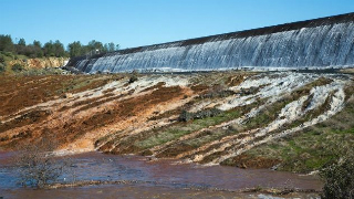 Excessive Drain Flow 'Jetting' from Sidewall Outlets signal Alarm in Spillway Slab Cracks & Poor Sealing of Slab seams.