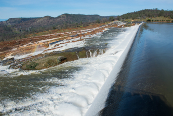 Water breaches the spillway at Oroville Dam on Feb. 12.