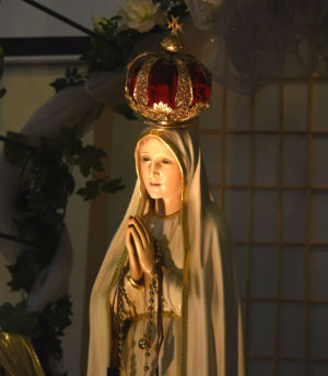On May 13, 1917, Mary appeared to three shepherd children bringing requests for the recitation of the rosary, for sacrifices on behalf of sinners, and a three-part secret regarding the fate of the world.