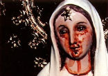 Image of Islamic terrorists desecrated consecrated hosts in a Catholic chapel [not pictured].