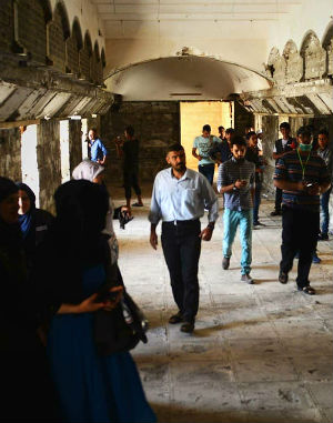 Young Muslims join Christians to rebuild a destroyed monastery in Iraq.