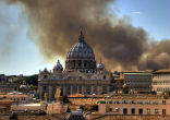 Image of Images showing smoke floating around the Vatican sparked fear of a terror attack on Pope Francis.
