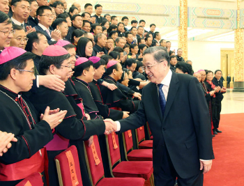 Yu Zhengsheng meeting with Church officials in 2016.