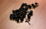 Image of An unnamed woman was found dead with rosary beads stuffed into her mouth.