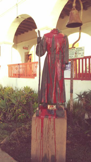 The vandalized statue of St. Serra has been removed for now.