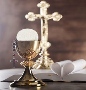 Vatican rejects a proposal to allow Protestants married to Catholics to receive the Eucharist in certain circumstances.