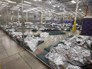 Children are being held in detention centers like this former converted Wal Mart. Children are held while their parents are prosecuted under Jeff Sessions Zero Tolerance policy.