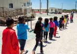 Image of Young undocumented immigrants are being held in tent camps. 