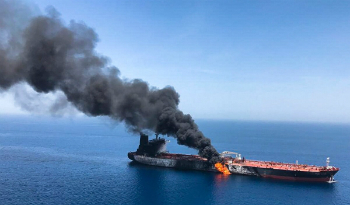 A tanker blazes after an alleged attack by Iranian or Iranian-backed forces.