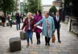 Image of Sarah Ewart L Jane Christie R and Grainne Teggart C leave Belfast High Court