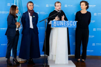 Brother Nicolas Tixier speaks at the signing of an agreement between the UAE and UNESCO