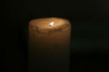 Image of Lit candle at the memorial for Orlando at St. Patrick's Catholic Church in Rome