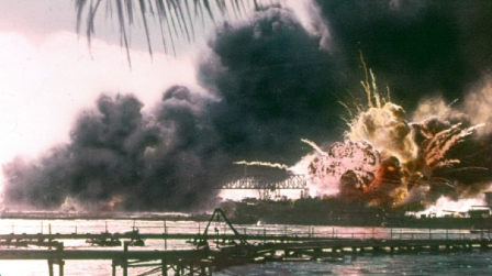 A colorized photo shows the moment the Mahan-class destroyer, USS Shaw (DD-373) exploded after bring attacked by Japanese dive bombers. The bombs detonated in her forward ammunition magazine, causing the explosion. Remarkably, Shaw was repaired and returned to service, earning 11 battle stars during the war. A colorized photo shows the moment the Mahan-class destroyer, USS Shaw (DD-373) exploded after bring attacked by Japanese dive bombers. The bombs detonated in her forward ammunition magazine, causing the explosion. Remarkably, Shaw was repaired and returned to service, earning 11 battle stars during the war.