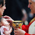 Image of POPE BLESSES BABY DURING MASS – Pope Benedict XVI blesses a baby during a Mass in St. Peter's Basilica at the Vatican June 29. In remarks made before praying the July 2 Angelus in St. Peter's Square, the pope urged the world's families to be 