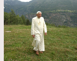 Image of POPE WALKS AT ITALIAN ALPS VACATION SPOT - Pope Benedict XVI walks July 14 at his vacation spot in the northern Italian village of Les Combes. The pope is staying in a mountain chalet in the shadow of Mont Blanc until July 28. (CNS/L'Osservatore Romano) 

