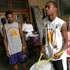 Image of ST. AUGUSTINE DRUM LINE AT PRACTICE – St. Augustine High School drum line members Alvin Ford Jr., center, and Kevin Lewis, right, practice a cadence as senior percussion leader Adrian Carr looks on in New Orleans July 26. The Marching 100, a nationally recognized marching band, was back sharpening its routine this summer. (CNS/Georgia Bulletin)
