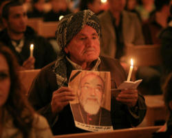 Image of The Chaldean Catholic faithful wept for the loss of Archbishop Rahho at the funeral Mass presided over by Cardinal Emmanuel III Delly, Patriarch of the Chaldean Catholic Church in Iraq.Present with the faithful were the the Chaldean Bishops in Iraq, Bishops of the Assyrian Eastern Church ,Syrian Catholic and Syrian Orthodox Church and monks of all the Iraqi churches.Pope Benedict XVI has spoken out strongly and repeatedly against the murder and offered Holy Mass in Rome for the slain Archbishop.
