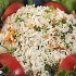 Image of RICE AND EASY - Combine jasmine rice, vegetables, and dressing for a simple salad.