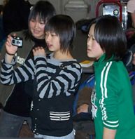Image of SAY CHEESE - A Japanese exchange student snapped a picture while friends looked on in Camden, Maine. The group of middle-schoolers from Hirakawa, Japan, visited Camden last year. (Martha White)