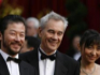 Image of Director Sergei Bodrov (C) and actors Tadanobu Asano (L) and Khulan Chuluun of 'Mongol' arrive at the 80th annual Academy Awards in Hollywood, February 24, 2008. Long on ethnographic detail and visual splendor but short on narrative coherence, Sergei Bodrov's 'Mongol' relates the story of Genghis Khan's early years in a plodding, uninspired fashion that doesn't bode well for the next two entries in a planned trilogy.