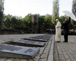 Image of At Auschwitz-Birkenau, humanity walked through a 