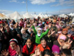 Image of Refugee camps are filled with women and children. The men are either fighting or dead. 