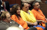 Image of Several former Bell officials wearing their proper uniform. 