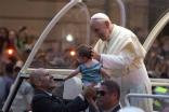 Image of Pope Francis has received an enthusiastic welcome from the world's youth.