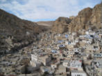 Image of Built against the side of a mountain, Maaloula is an ancient Christian enclave where the inhabitants still speak Aramaic, the language of Christ. 