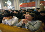 Image of Catholics praying at Mass