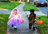 Image of Happy trick or treaters on Halloween.
