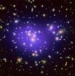 Image of Galaxy clusters such as these should be more common throughout the universe than they are. 