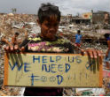 Image of In the aftermath of Typhoon Hiyan, food aid streamed in from arpund the world. Now that aid is decreasing but the government still can't take over from private agencies. CRS, Oxfam, the Red Cross, YCVF and other agencies are still essential for survival. 