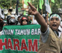 Image of Indonesian Muslims demonstrate against Christians on Christmas. 