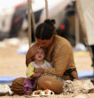 Image of Christians face more than the Islamic State. Destitute, they lack sanitation, privacy, food and water, and their spiritual end educational needs aren't being met. A tremendous effort will be needed to restore these people. Let us pray.