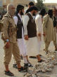 Image of ISIS crushes the skull of a man accused of having an affair.