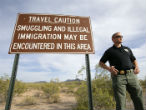 Image of Signs warn Americans that U.S. authorities have no control in the region, which has likely been rented to the cartels. 