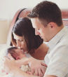 Image of Baby Abigail photographed with her parents.