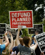 Image of Pro-life advocates demand the defunding of Planned Parenthood.