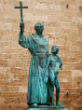 Image of A statue honoring Junipero Serra depicts him as a loving, Christian guardian, but there are many who might argue differently. Regardless of opinion, the judgement of the Church and God will rule. 