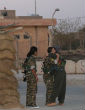 Image of Roza, Deijly, and Raparin embrace (Owen Holdaway).