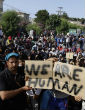 Image of Refugees in Lesbos live in squalor while waiting to be registered.