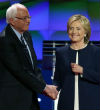 Image of Sanders and Clinton appeared to be friends rather than adversaries during their debate in Las Vegas. Neither candidate went on the offensive against one another (CNN). 