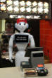 Image of Several companies are developing machines and robots that can replace legions of low-wage, low-skilled workers. The cost savings would be tremendous. It would also be of benefit to the workers themselves, a least in the long run. 