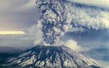 Image of First the Kalama River runs white, then Mt. St. Helens erupts. 