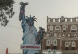 Image of Yemen capital covered in anti-America graffiti (Twitter).