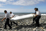 Image of Investigators remove the part from Tanzania. 